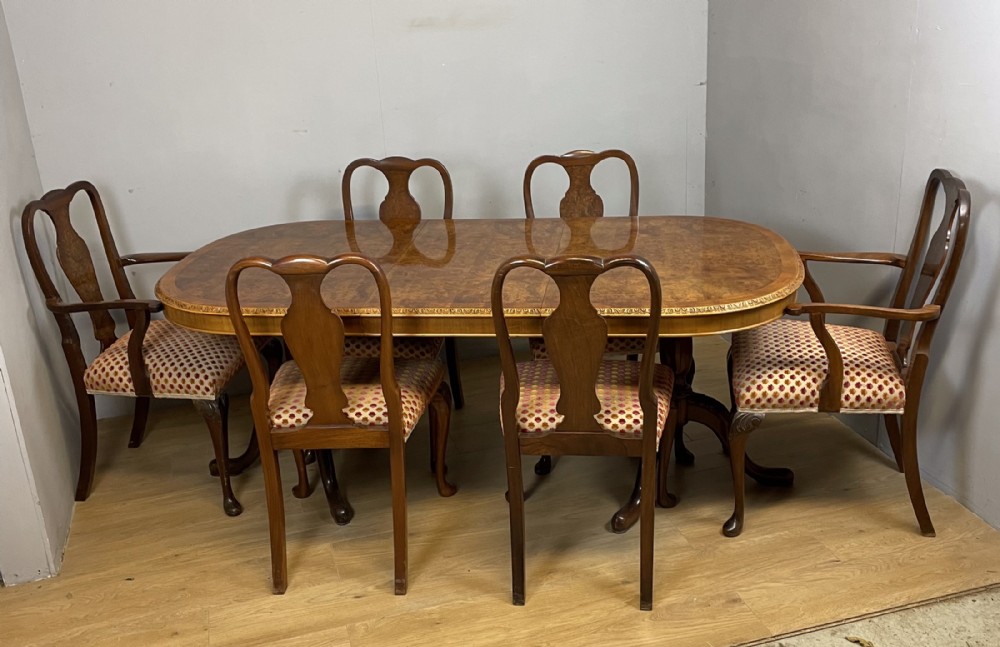 Burr walnut Epstein style extending dining table and six chairs circa 1930