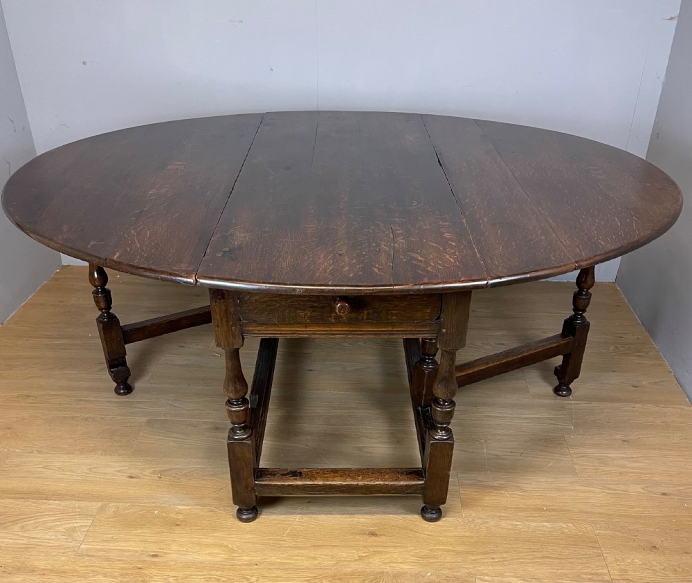 Large early nineteenth century 8 seater oak drop leaf dining table 