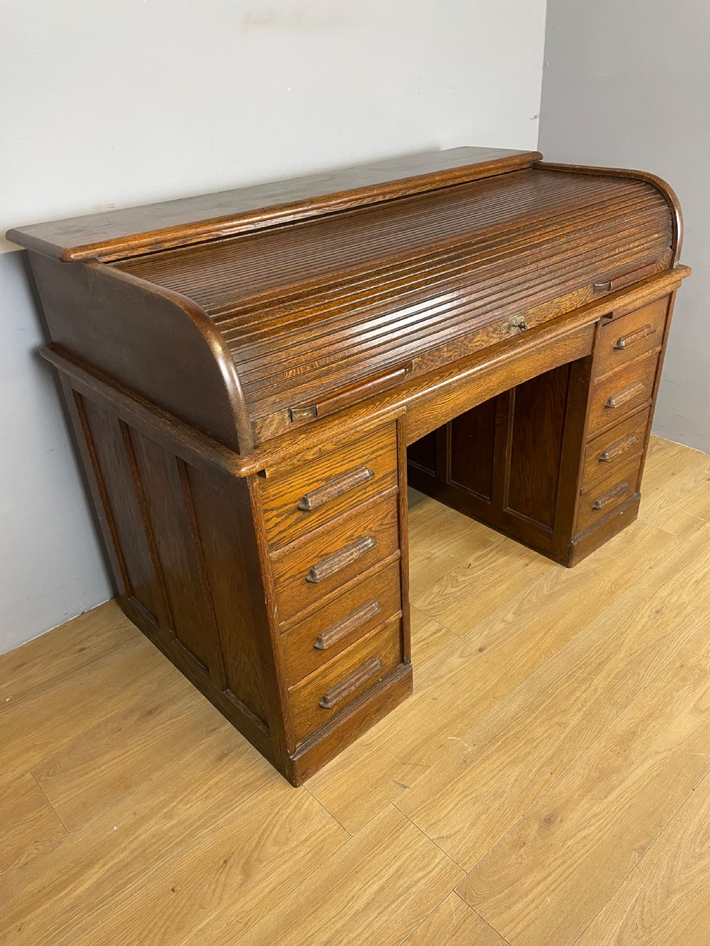 Oak twin pedestal roll top desk circa 1920 View II