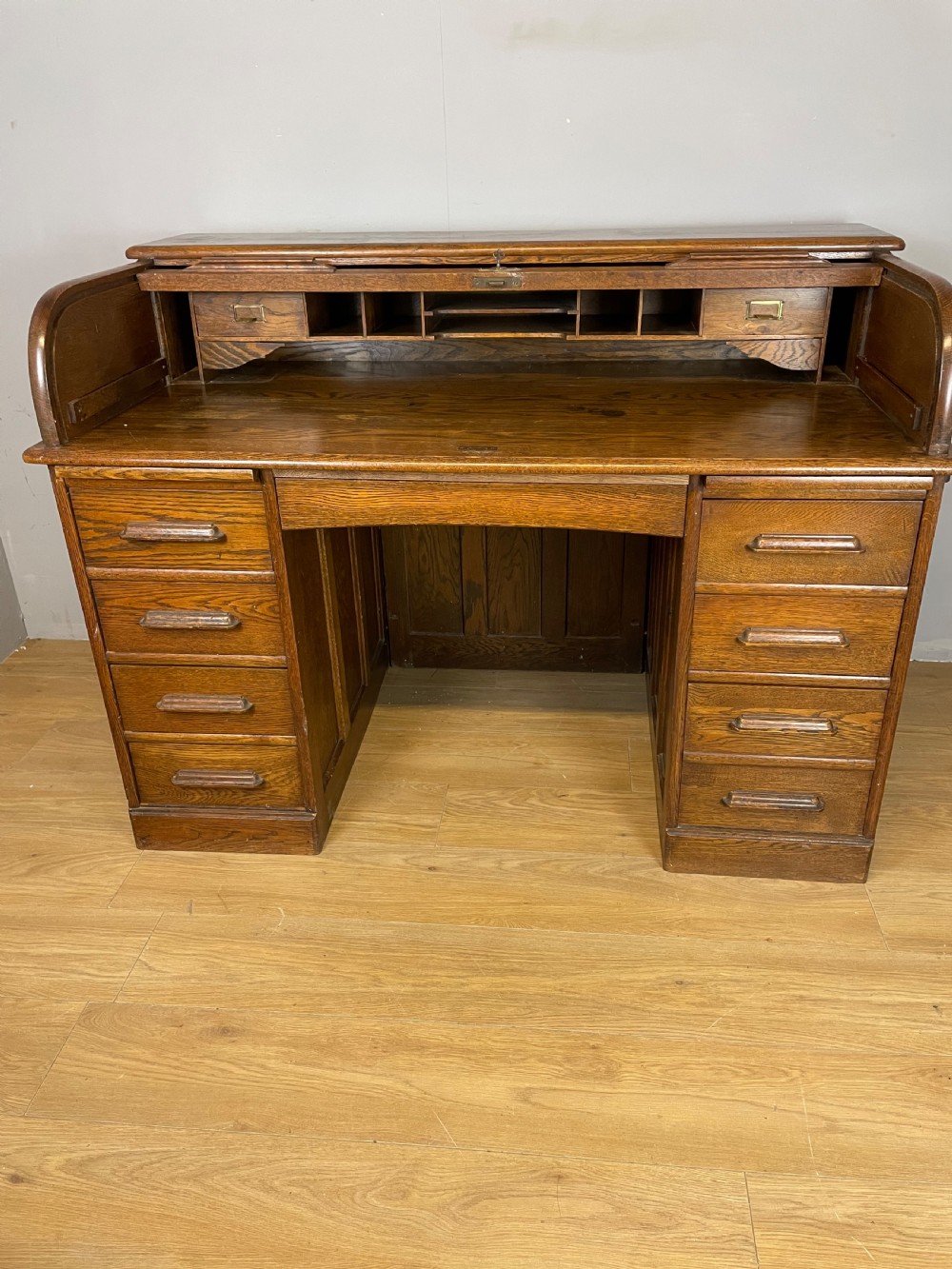Oak twin pedestal roll top desk circa 1920 View III