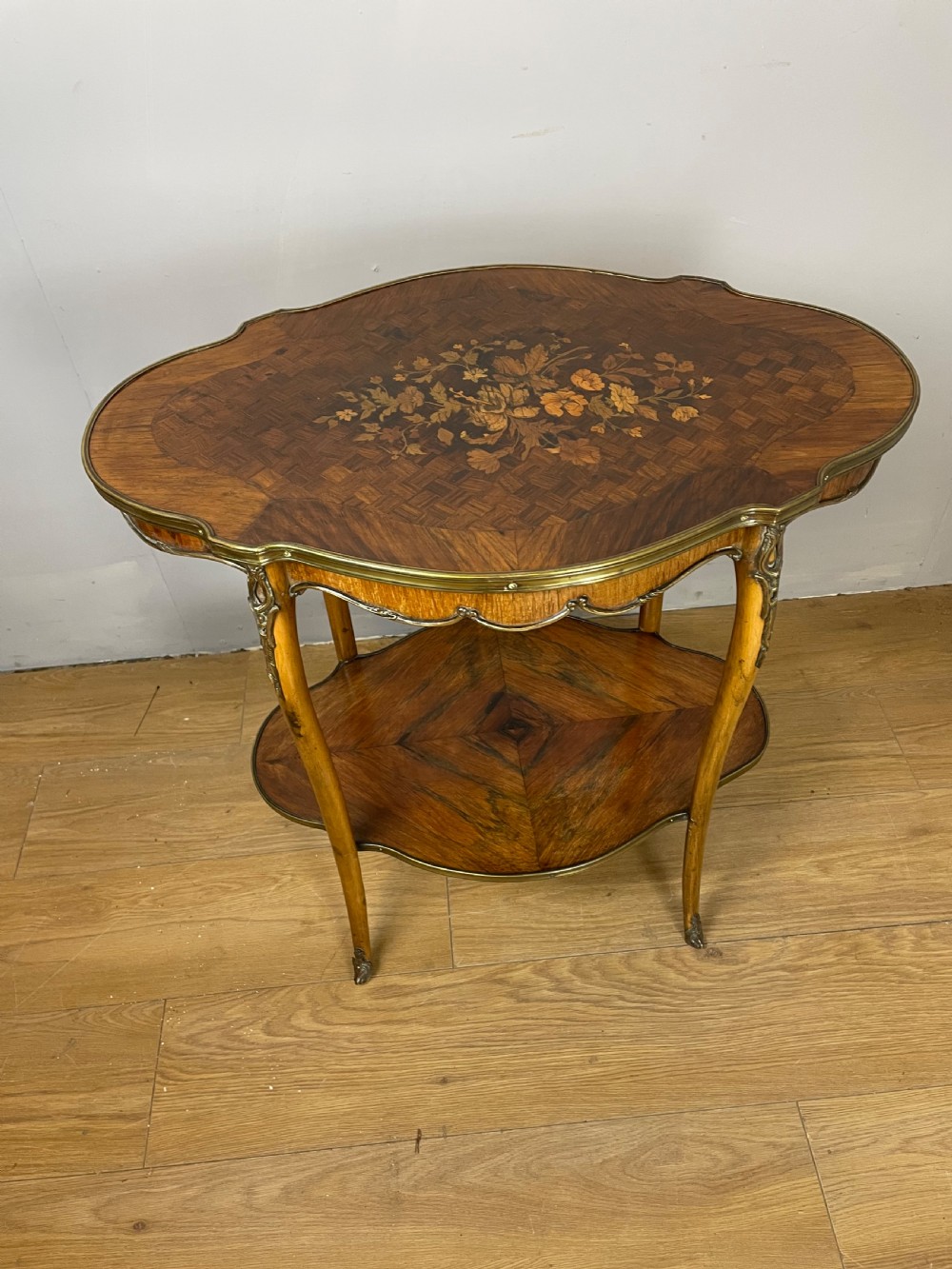 Nineteenth century inlaid rosewood two tier ormolu mounted table 