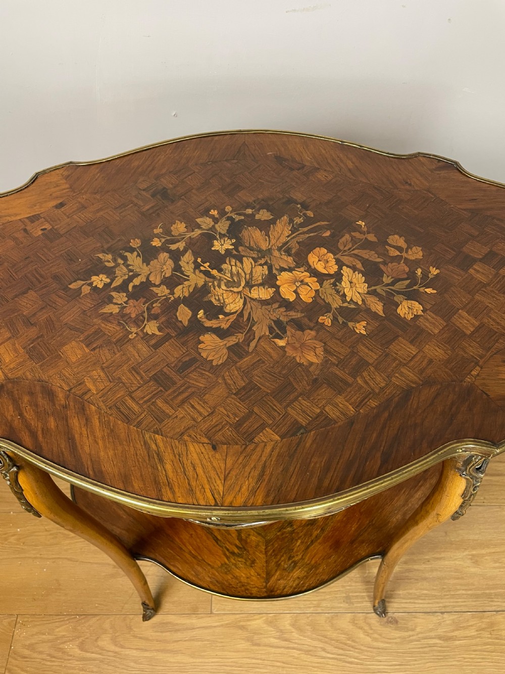 Nineteenth century inlaid rosewood two tier ormolu mounted table  View II