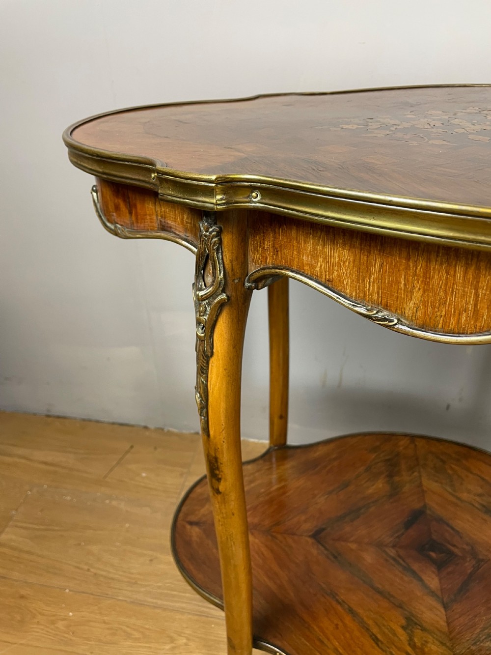 Nineteenth century inlaid rosewood two tier ormolu mounted table  View IV