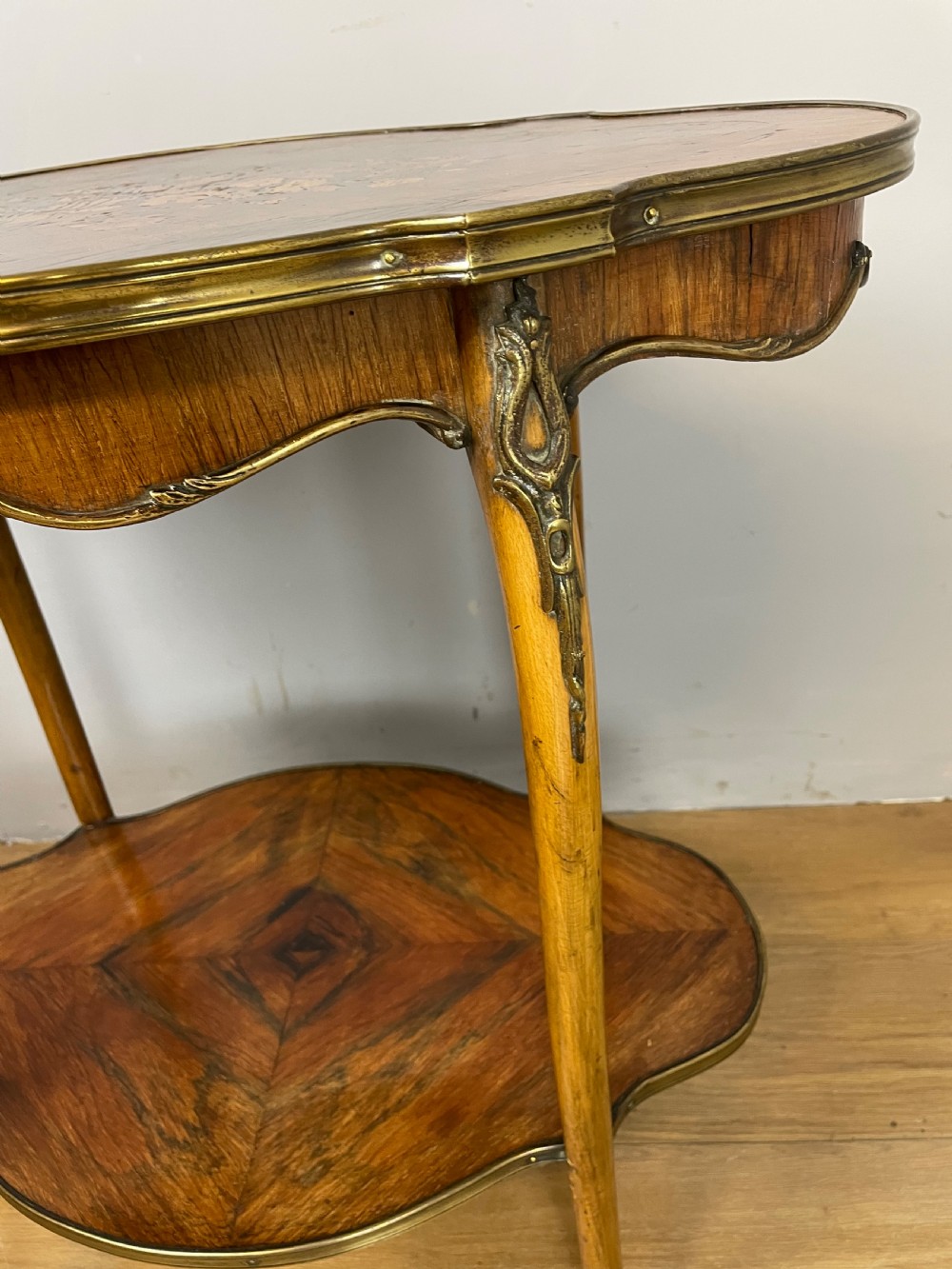 Nineteenth century inlaid rosewood two tier ormolu mounted table  View V