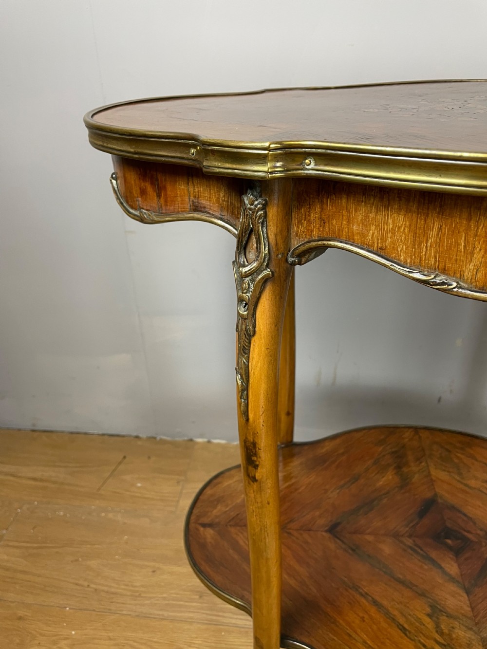 Nineteenth century inlaid rosewood two tier ormolu mounted table  View VIII