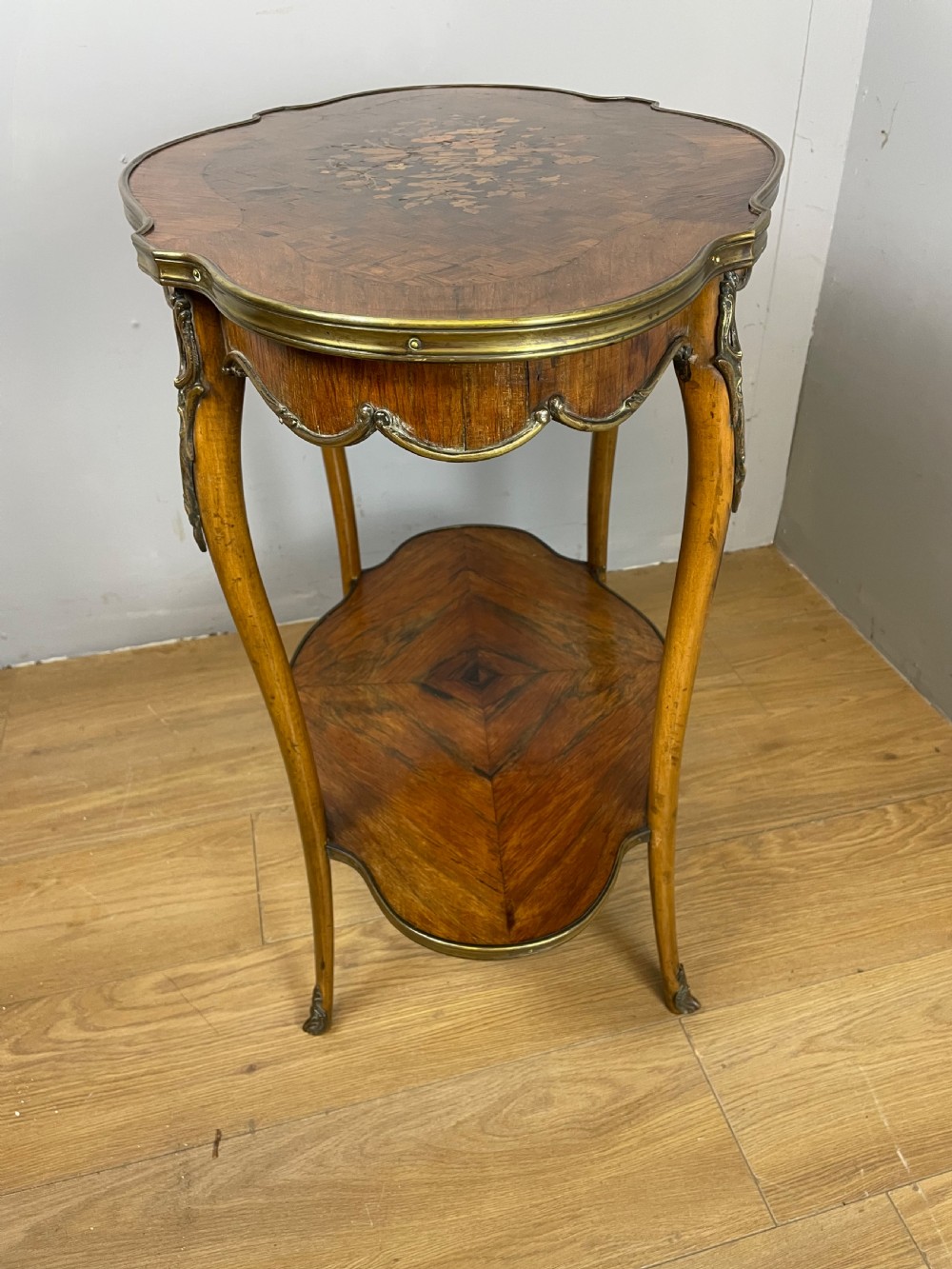Nineteenth century inlaid rosewood two tier ormolu mounted table  View IX