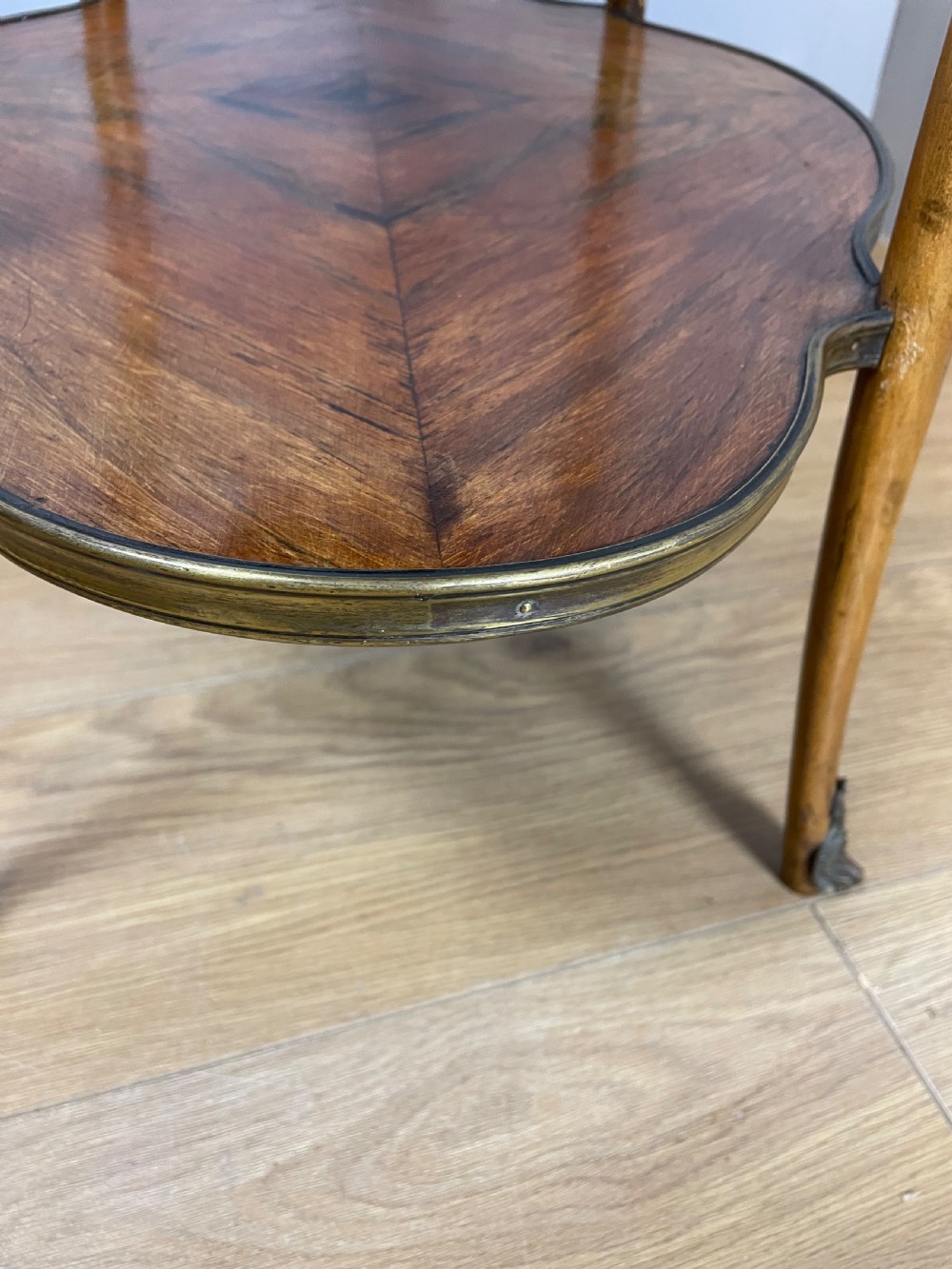 Nineteenth century inlaid rosewood two tier ormolu mounted table  View XI