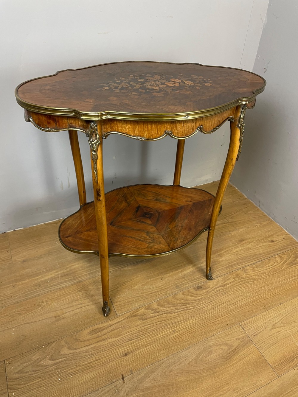 Nineteenth century inlaid rosewood two tier ormolu mounted table  View XII