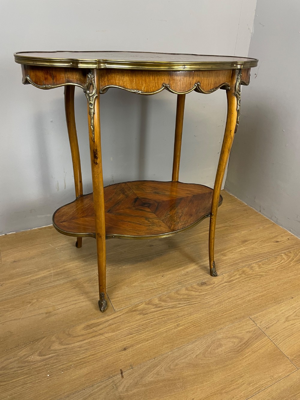 Nineteenth century inlaid rosewood two tier ormolu mounted table  View XIV
