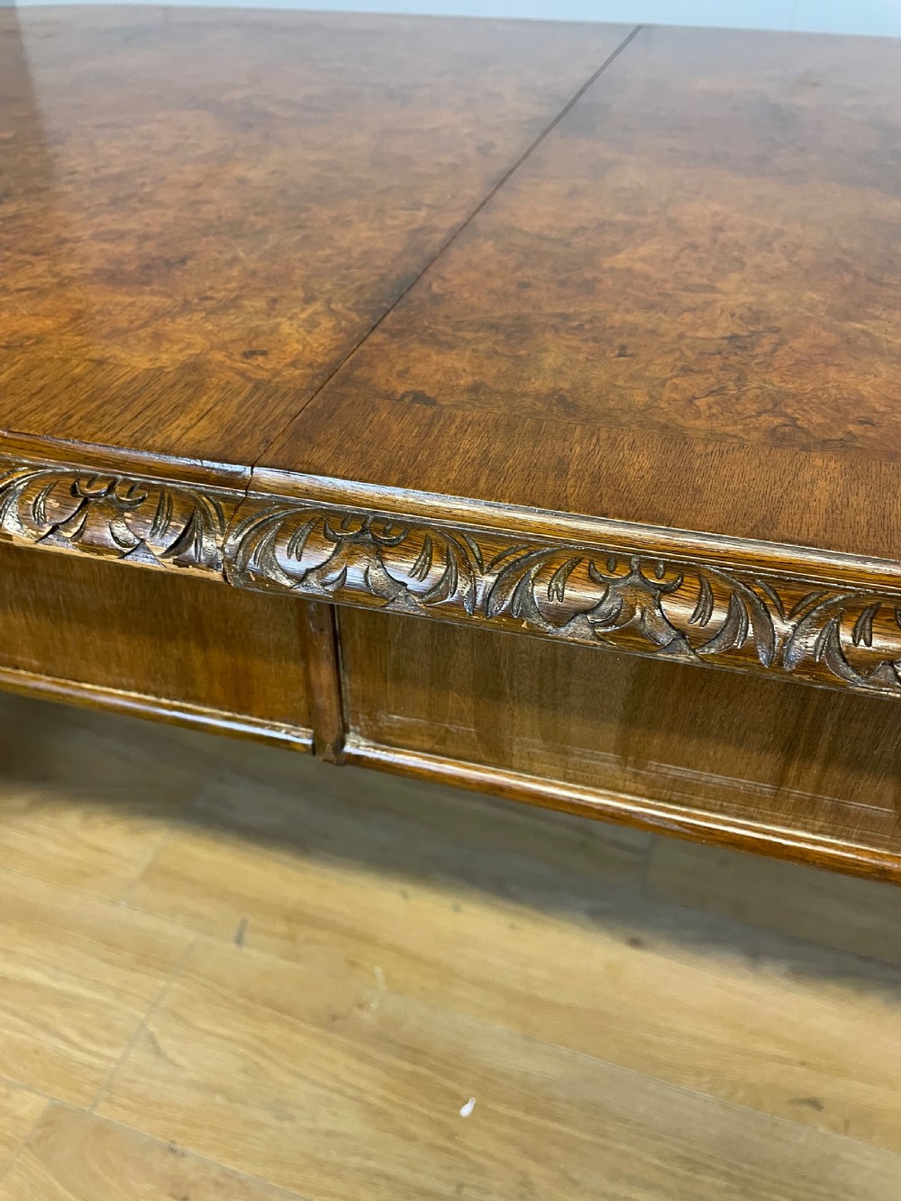 Burr walnut extending dining table on carved cabriole legs  View V