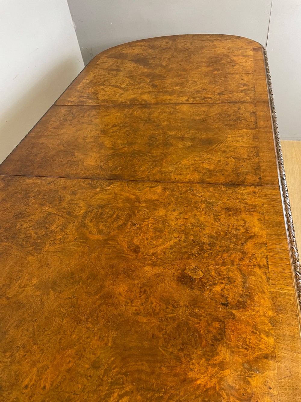 Burr walnut extending dining table on carved cabriole legs  View VII