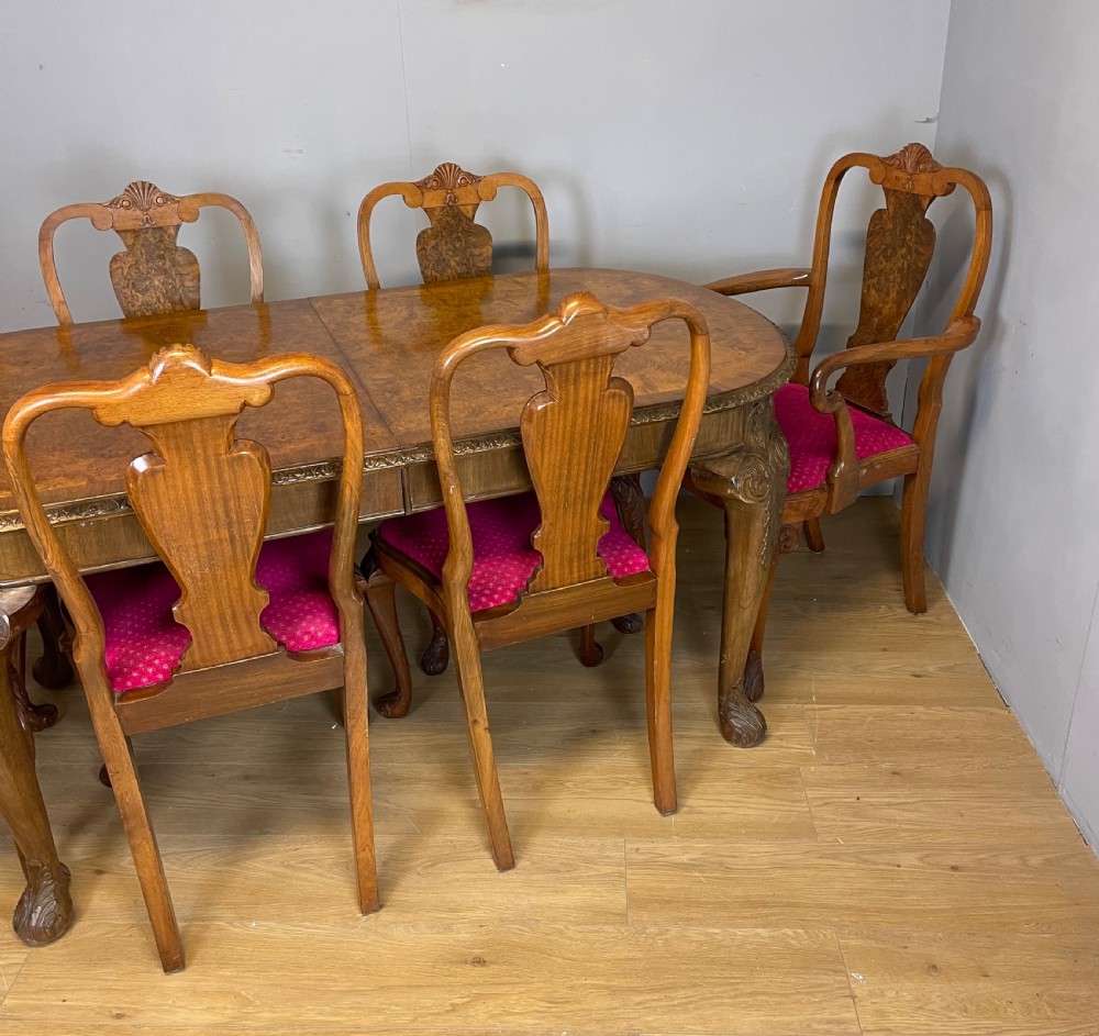 Burr walnut extending dining table on carved cabriole legs  View XIV