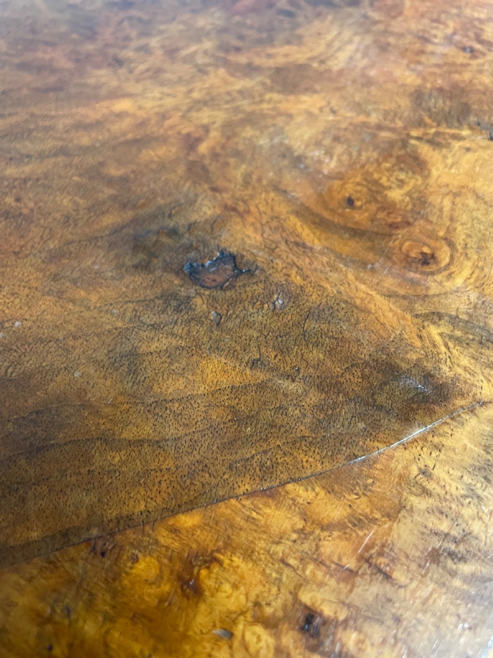 Burr walnut extending dining table on carved cabriole legs  View XVI