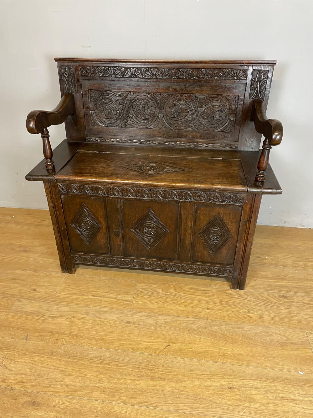 Nineteenth century carved oak box settle View II