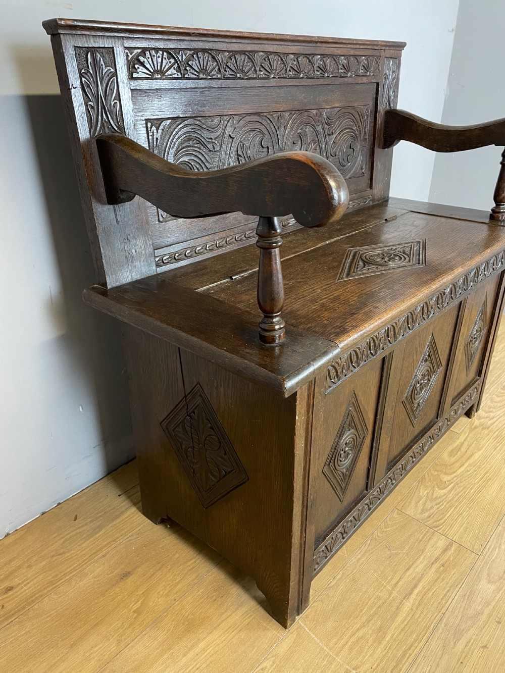 Nineteenth century carved oak box settle View III