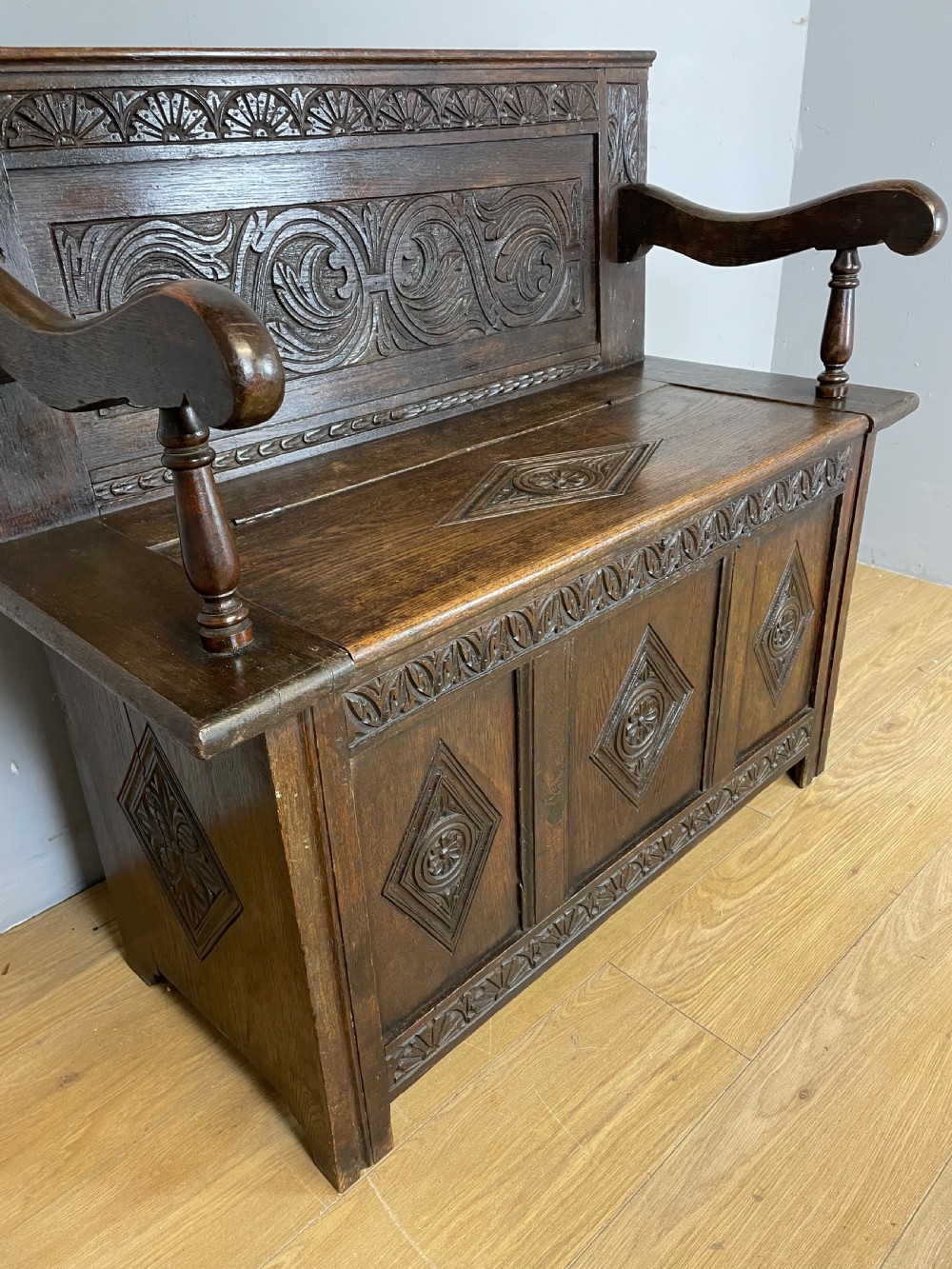 Nineteenth century carved oak box settle View IV