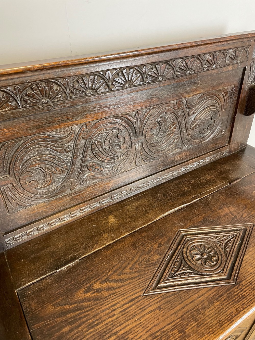 Nineteenth century carved oak box settle View V