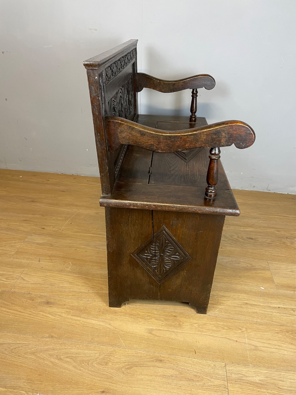 Nineteenth century carved oak box settle View VI