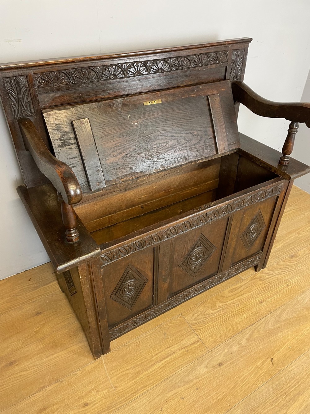Nineteenth century carved oak box settle View VII