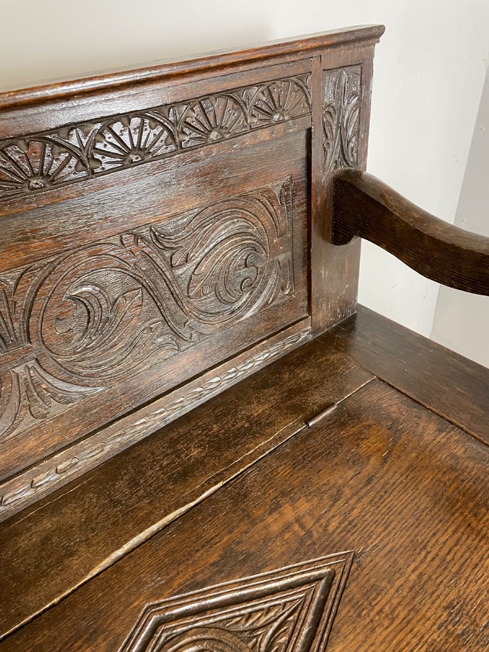 Nineteenth century carved oak box settle View X