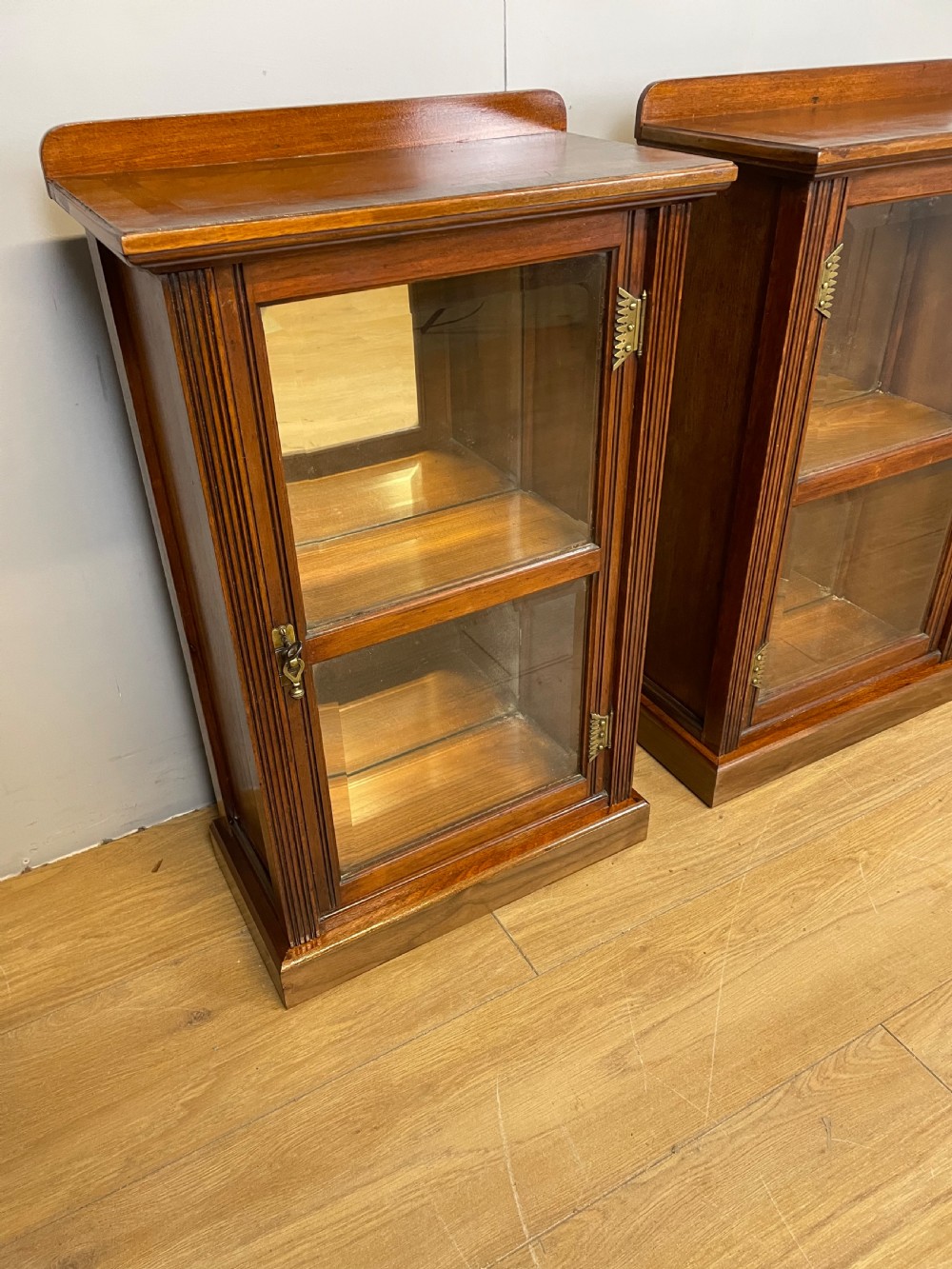 Small  pair of freestanding glazed walnut cabinets  View III