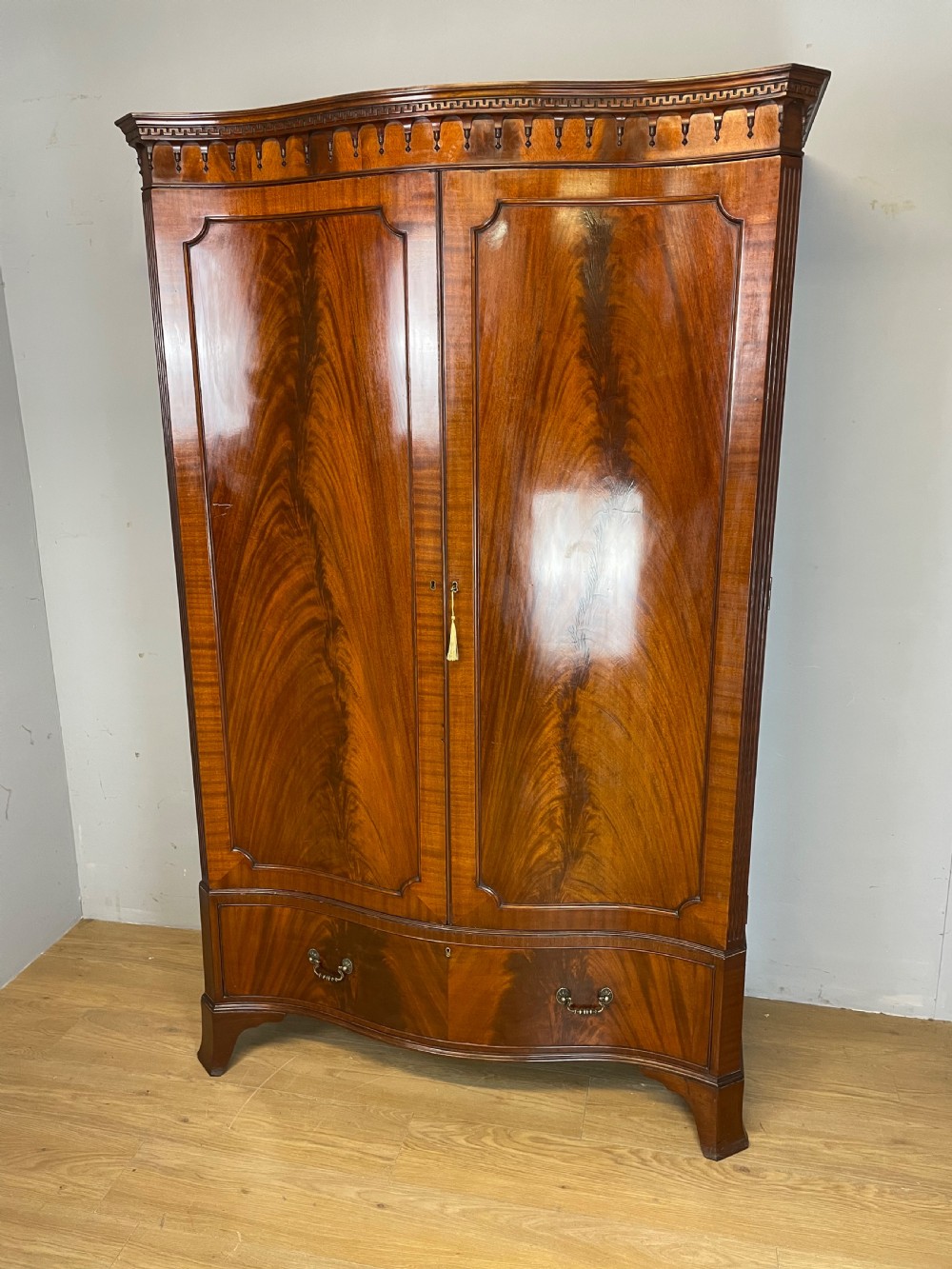 Edwardian flame mahogany serpentine fronted wardrobe  View II
