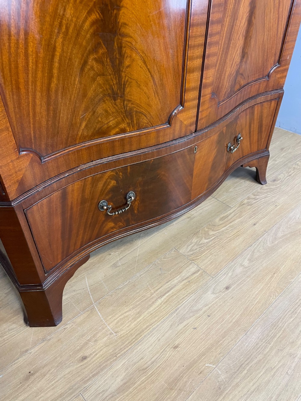 Edwardian flame mahogany serpentine fronted wardrobe  View VI