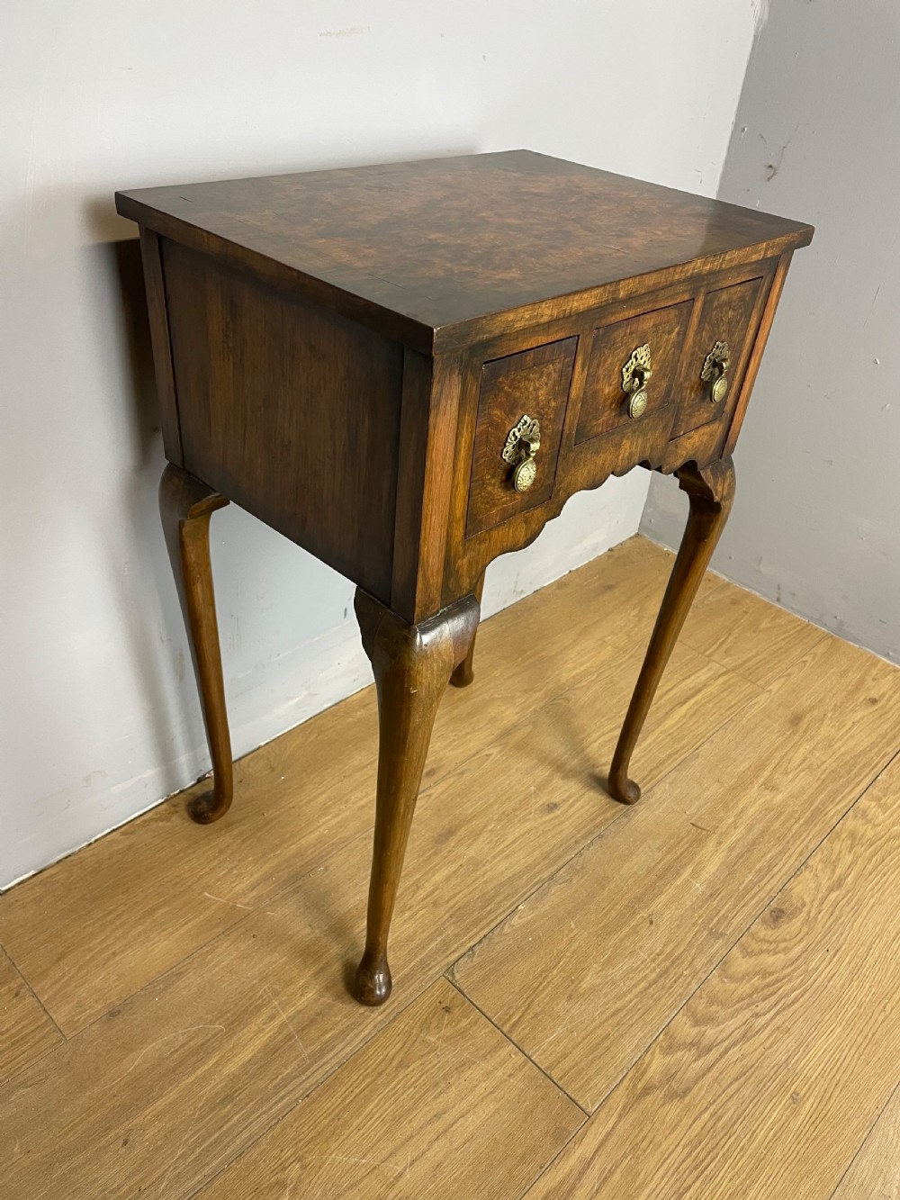 Small Georgian style burr walnut lowboy circa 1920 View II