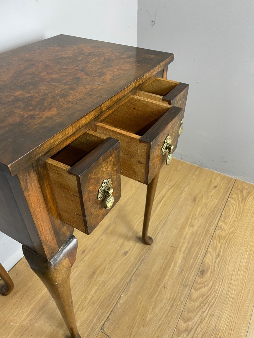 Small Georgian style burr walnut lowboy circa 1920 View V