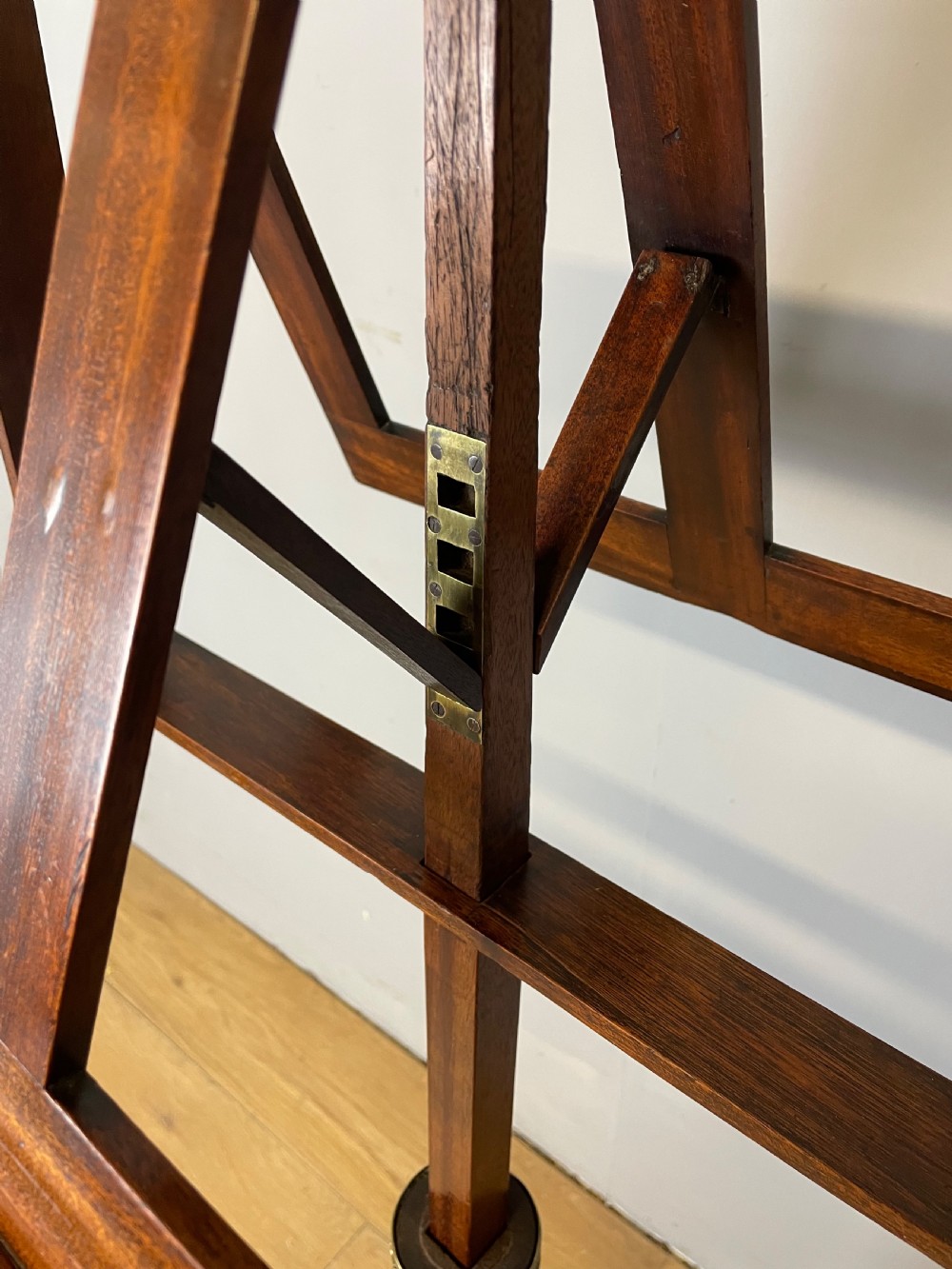 A 19th-century mahogany duet music stand featuring a double-sided adjustable reading frame on a turned column with brass fittings and tripod base. View II