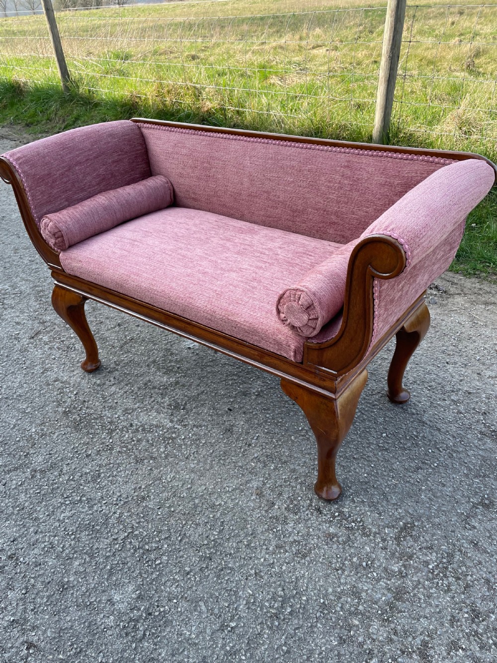 C19TH walnut small window seat in the form of a scroll end sofa 