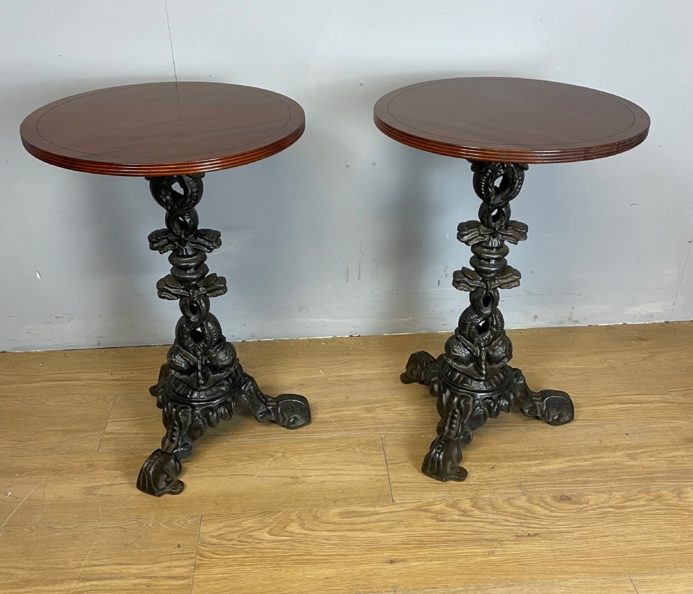 C19TH pair of cast iron tables with mahogany to tops  View II