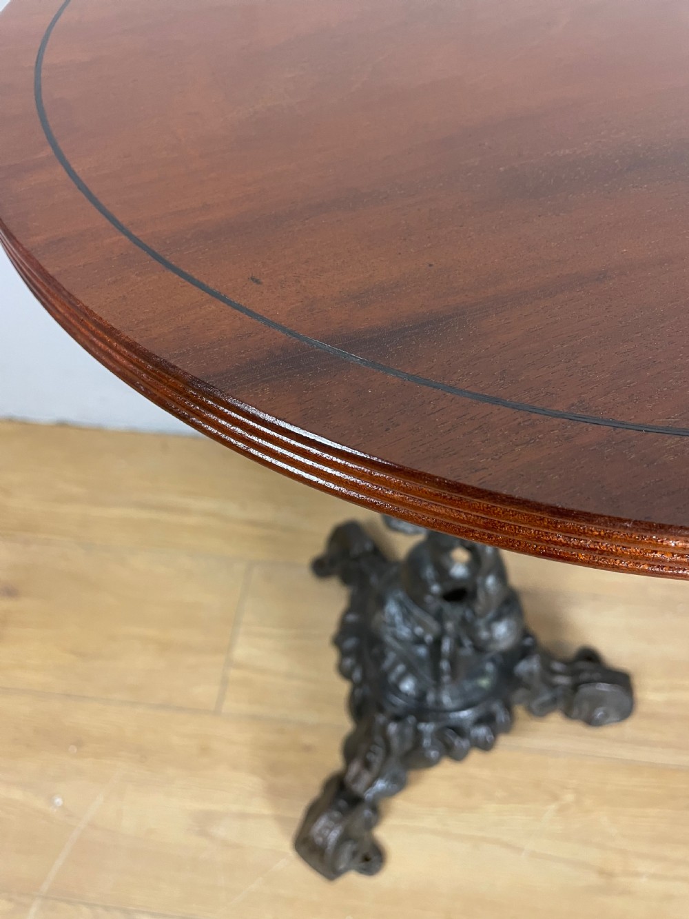 C19TH pair of cast iron tables with mahogany to tops  View IV