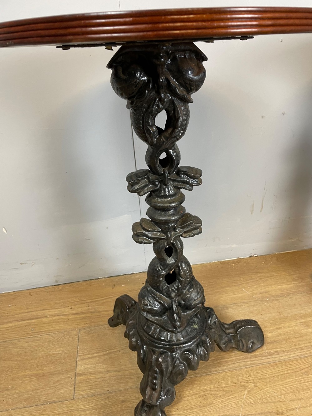 C19TH pair of cast iron tables with mahogany to tops  View V