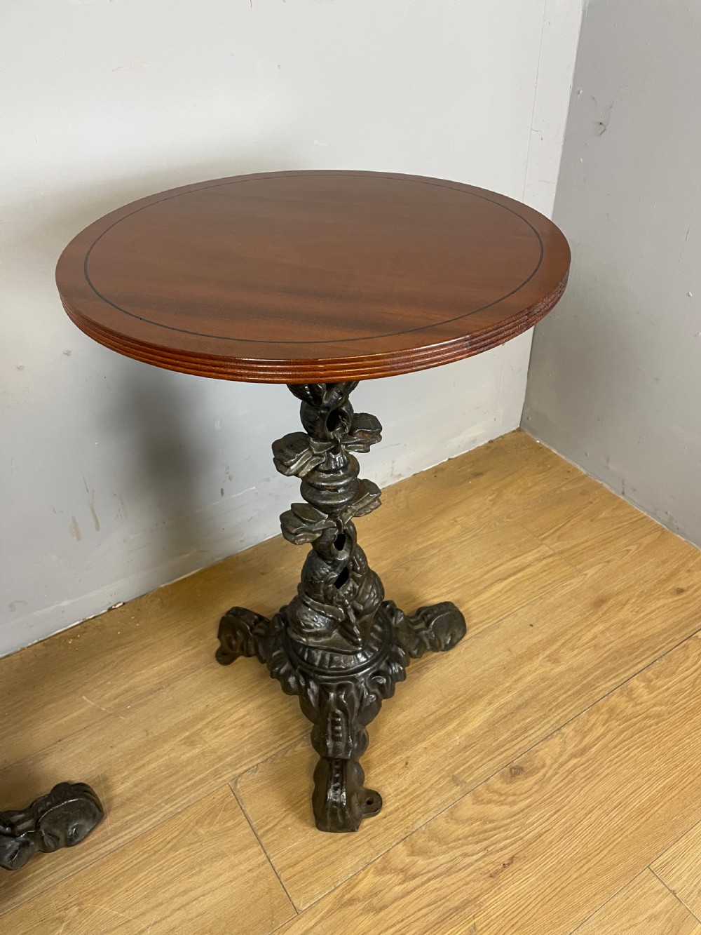 C19TH pair of cast iron tables with mahogany to tops  View VI