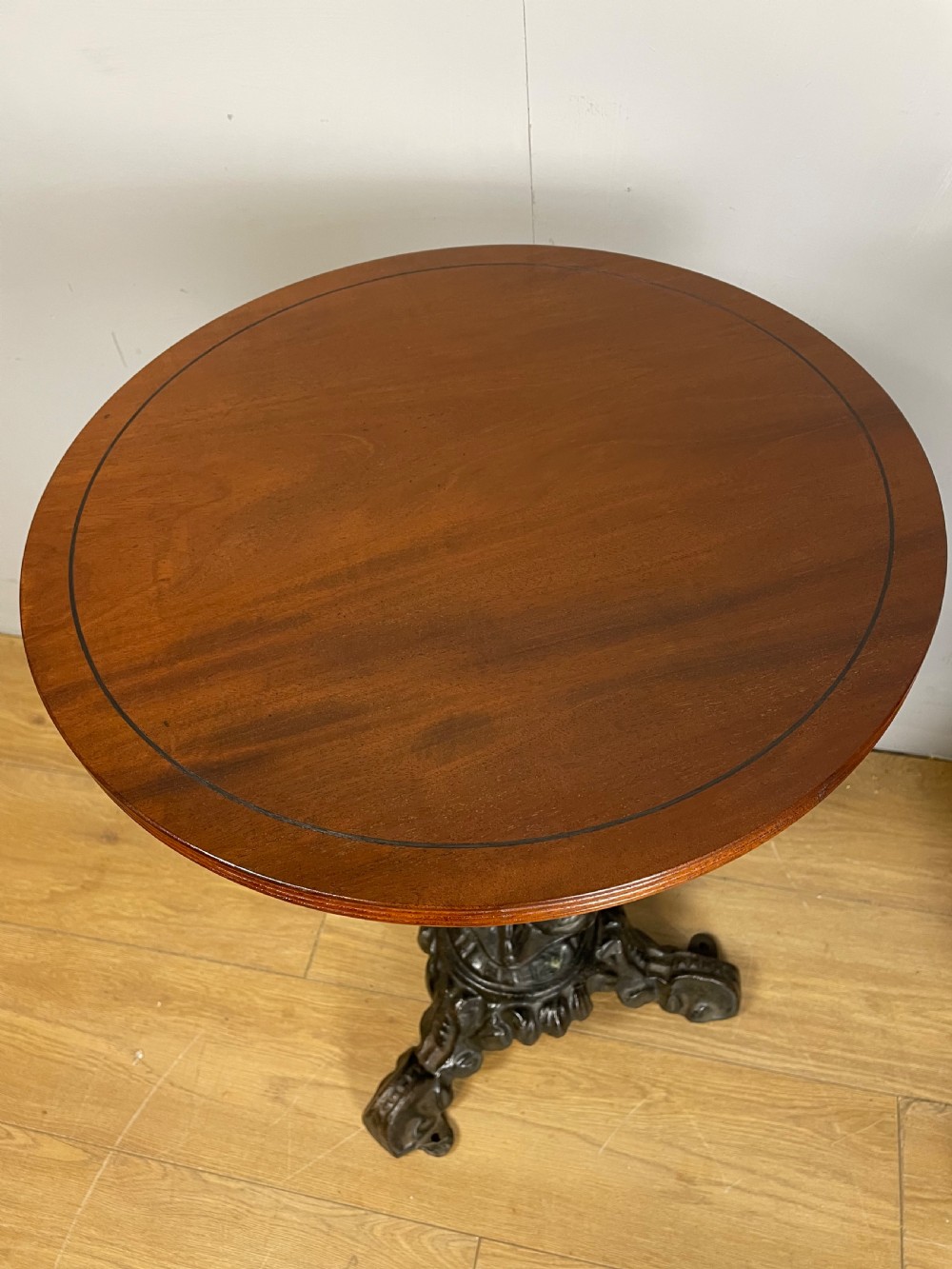 C19TH pair of cast iron tables with mahogany to tops  View VII