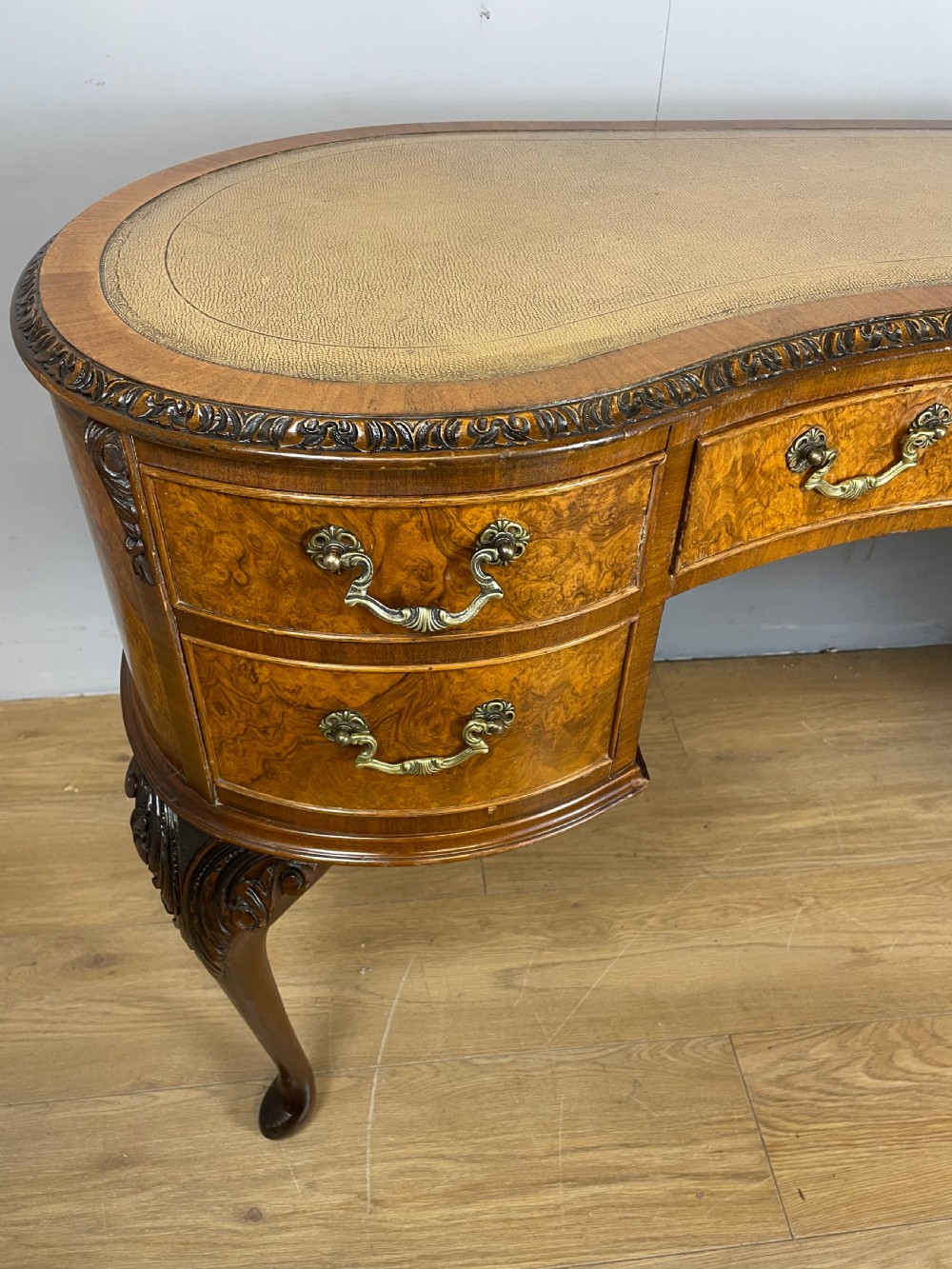 Burr walnut kidney shaped desk with inset leather top View II