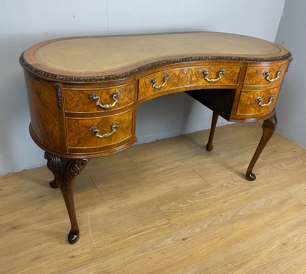 Burr walnut kidney shaped desk with inset leather top View IV