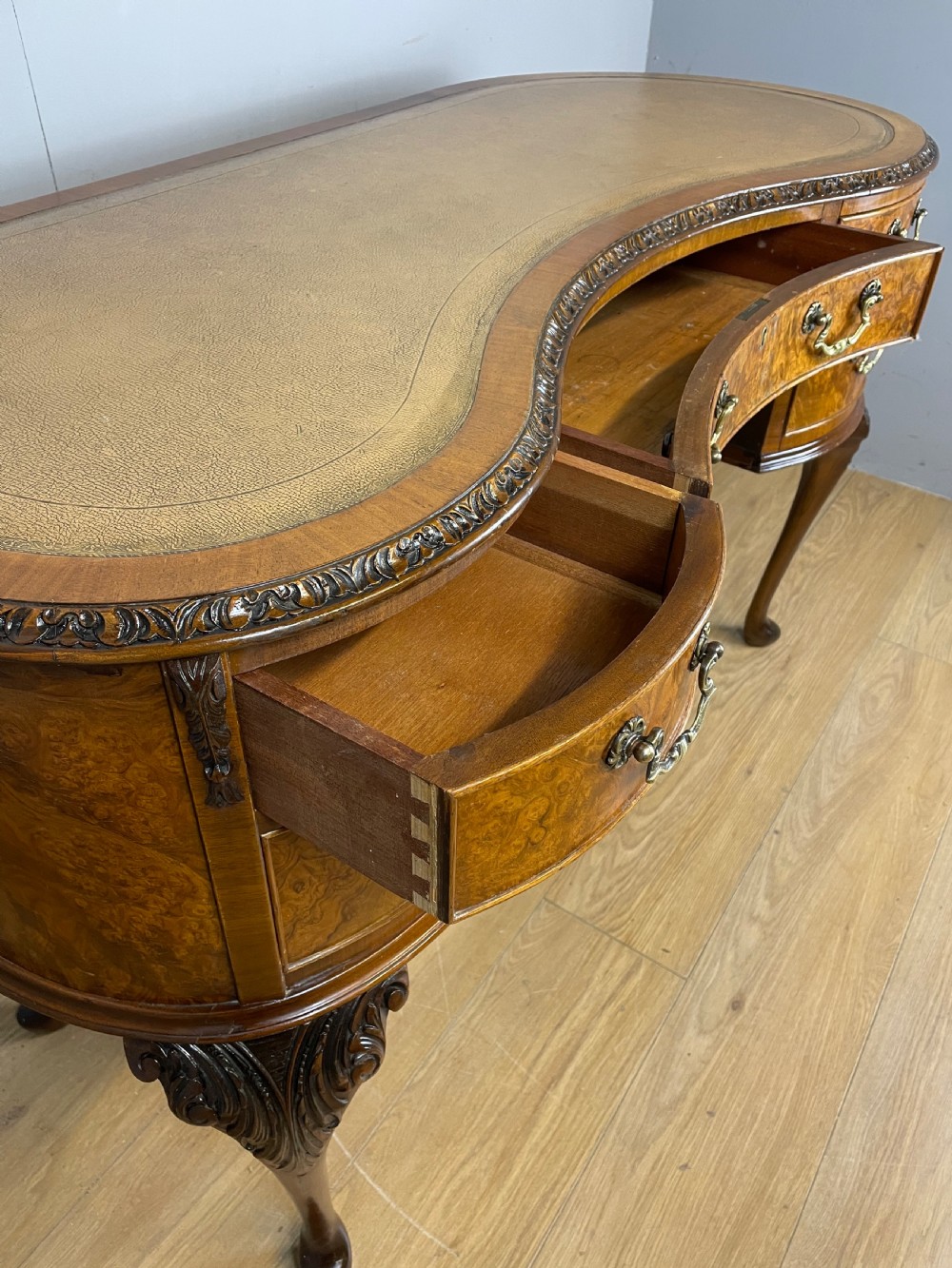 Burr walnut kidney shaped desk with inset leather top View VII