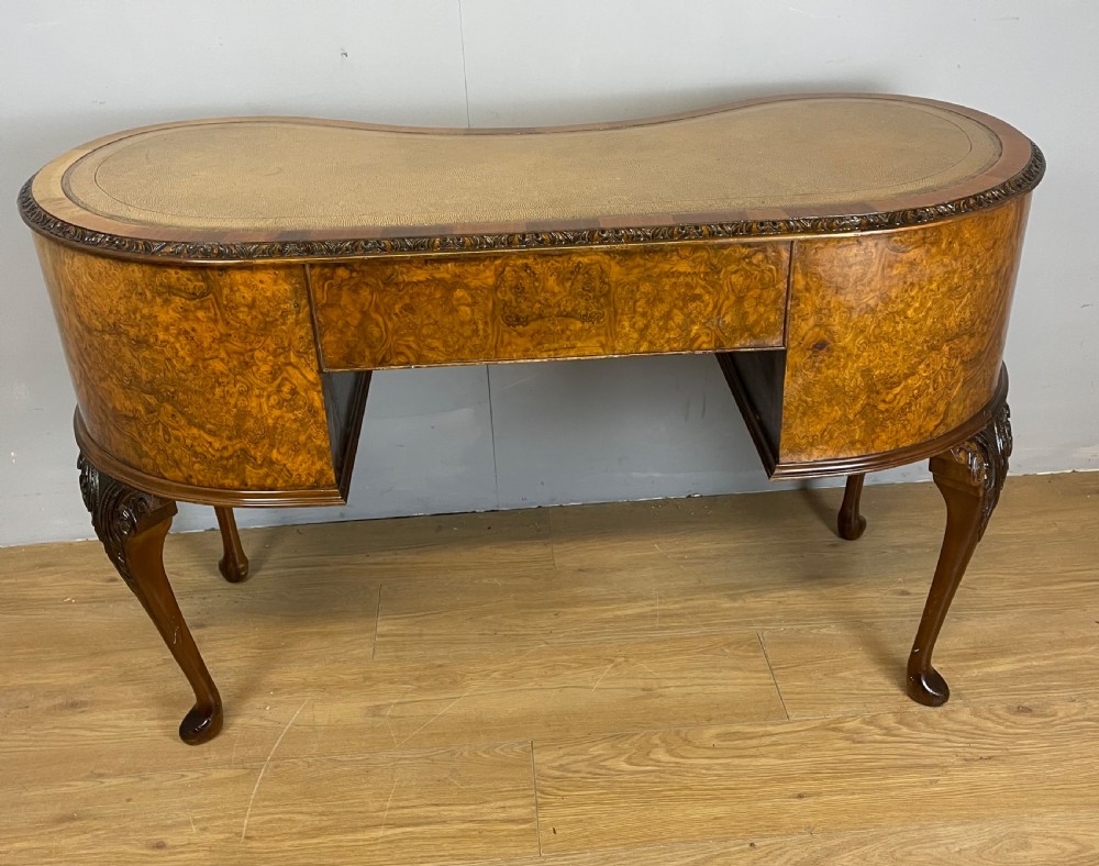 Burr walnut kidney shaped desk with inset leather top View VIII