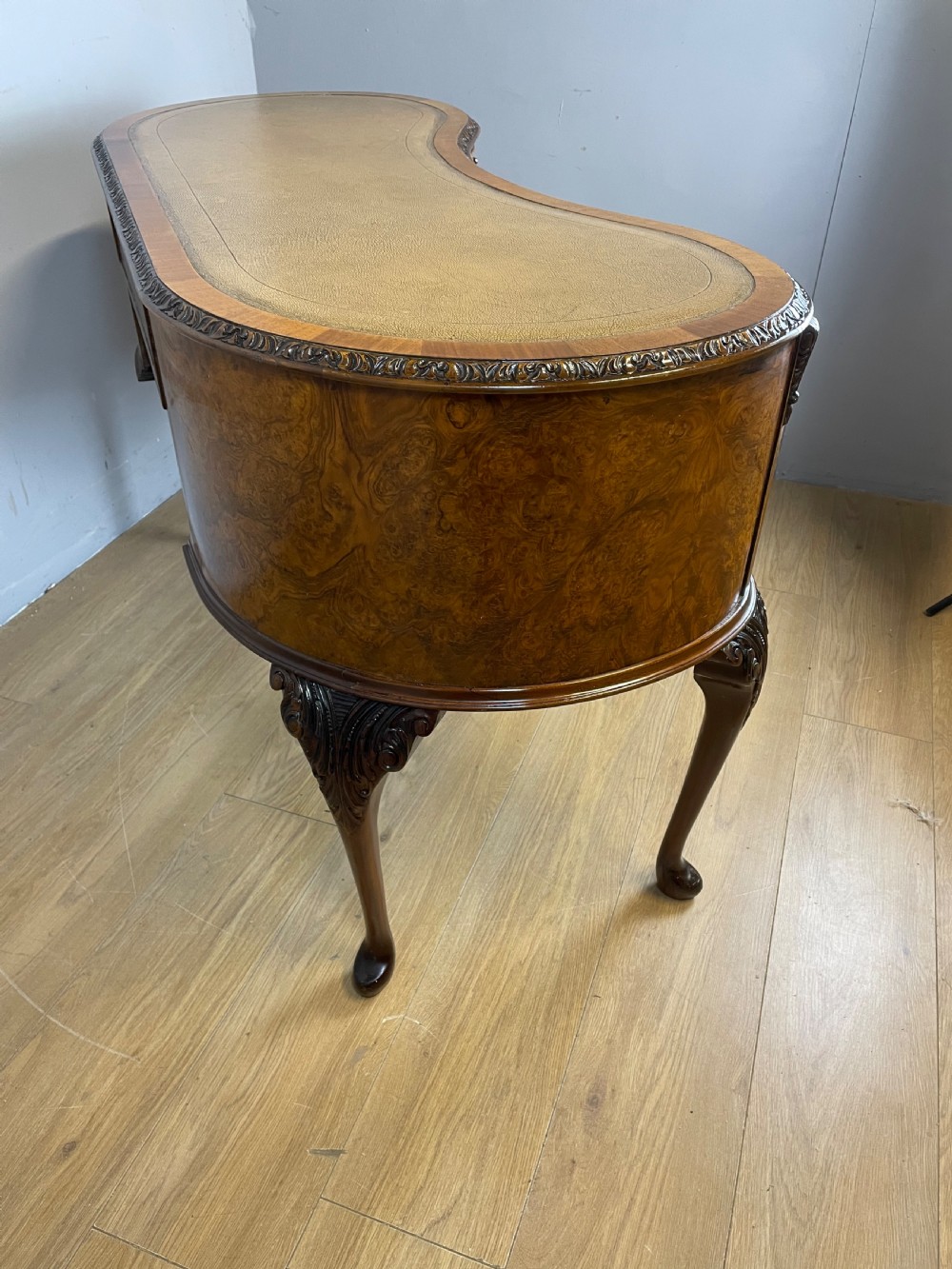 Burr walnut kidney shaped desk with inset leather top View IX