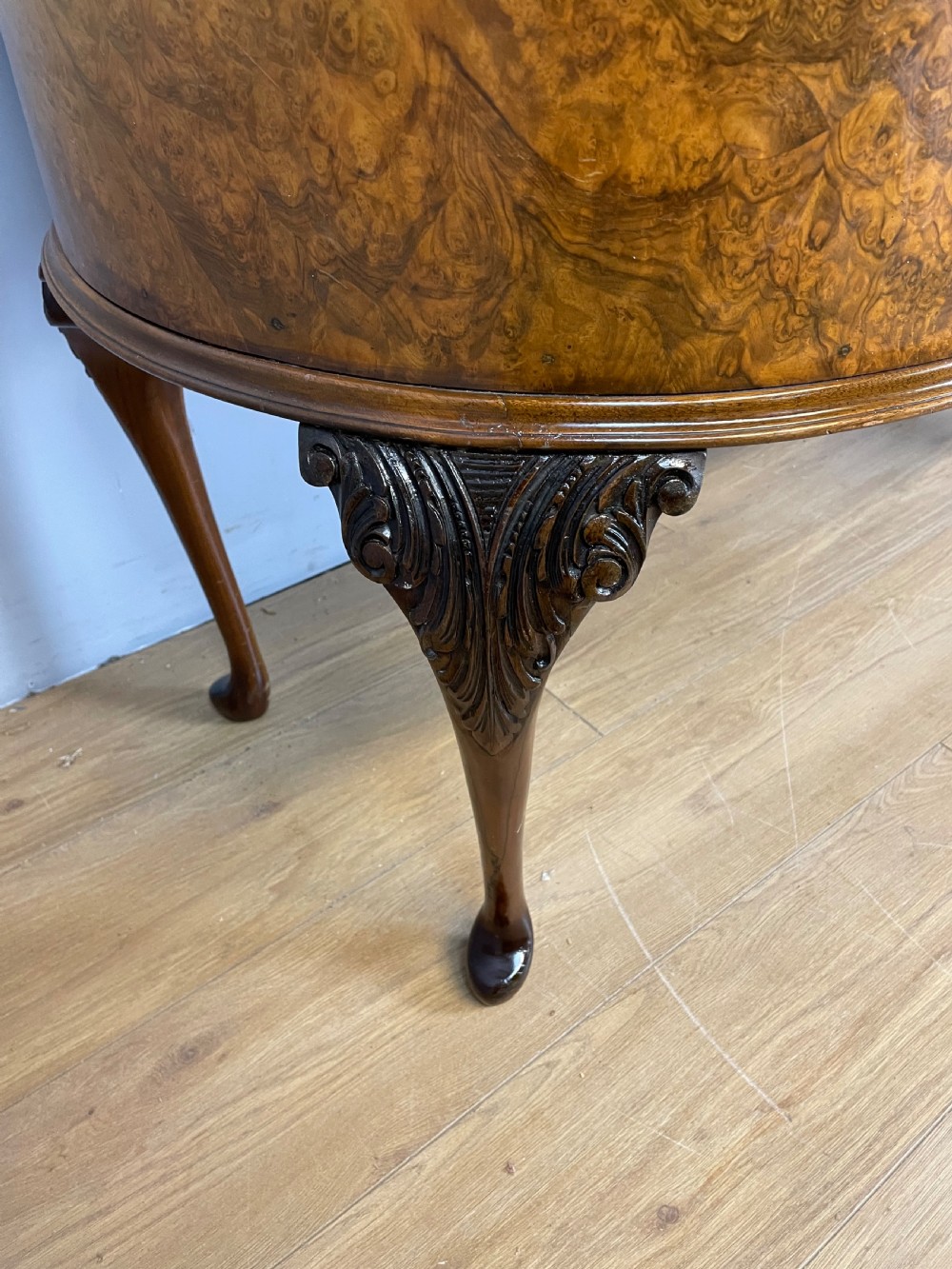 Burr walnut kidney shaped desk with inset leather top View X