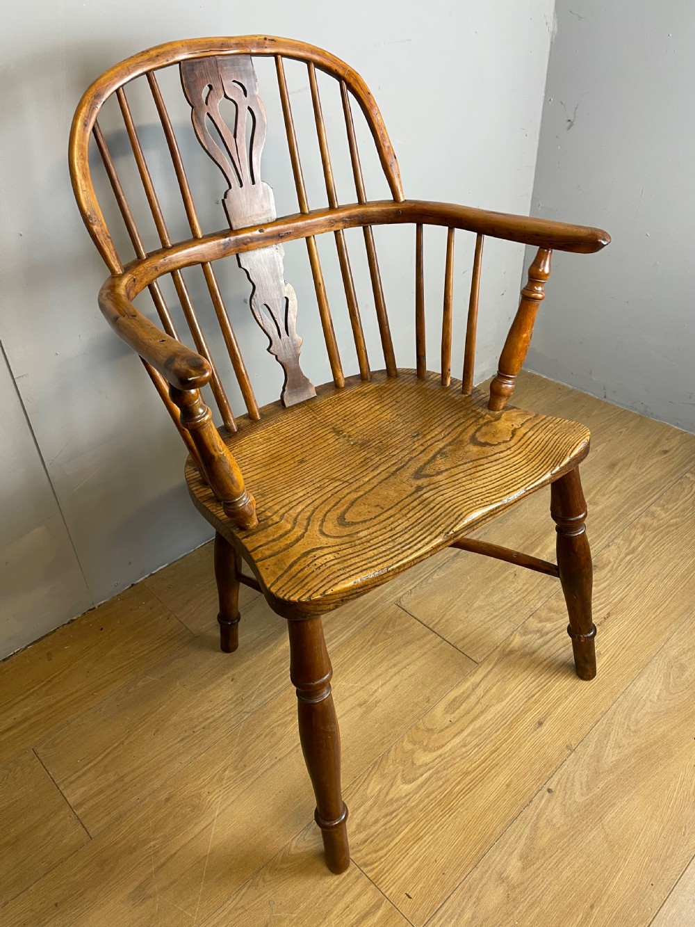Early nineteenth century yew and elm Windsor chair with crinoline under stretcher  View III