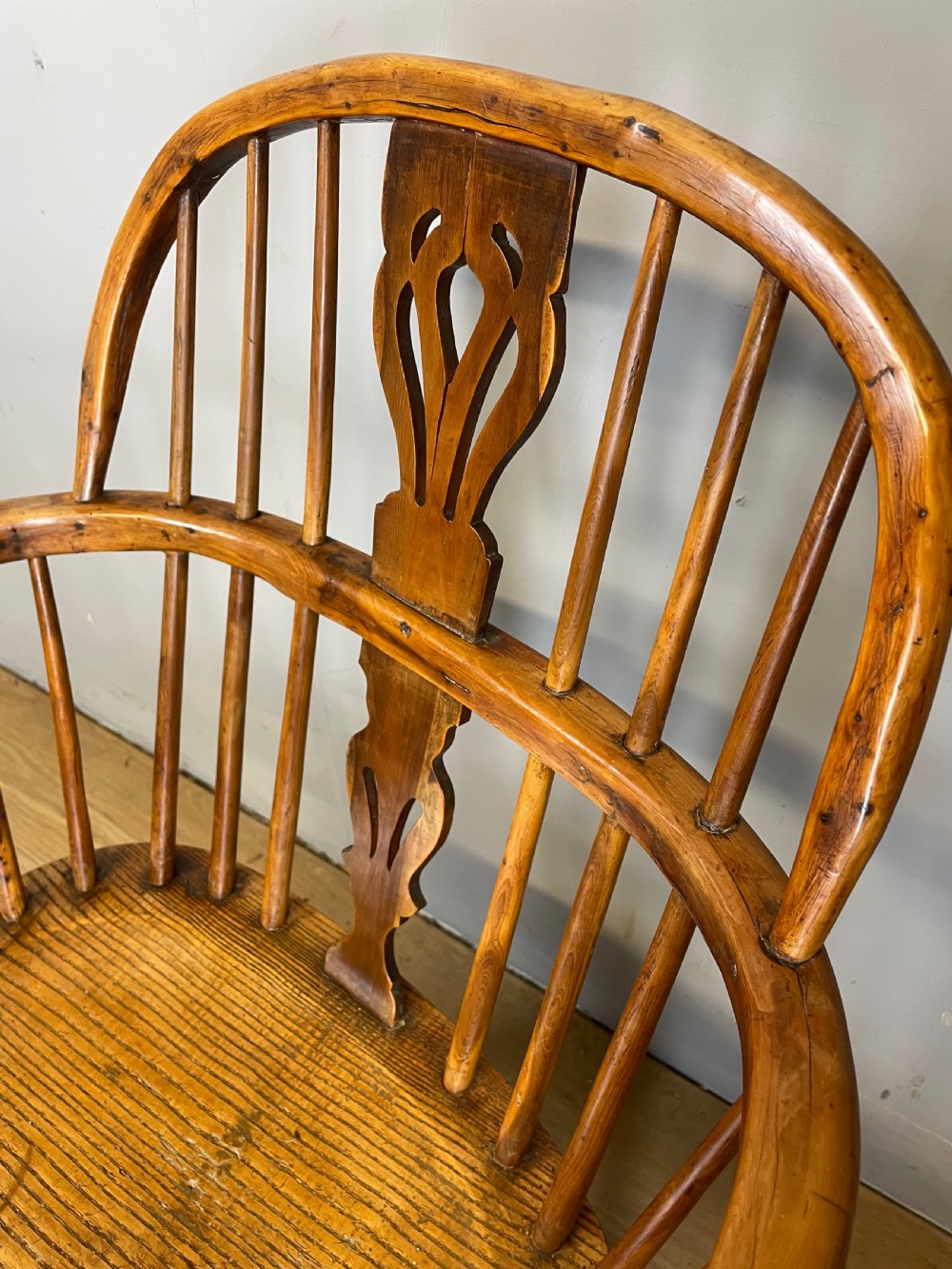 Early nineteenth century yew and elm Windsor chair with crinoline under stretcher  View IV