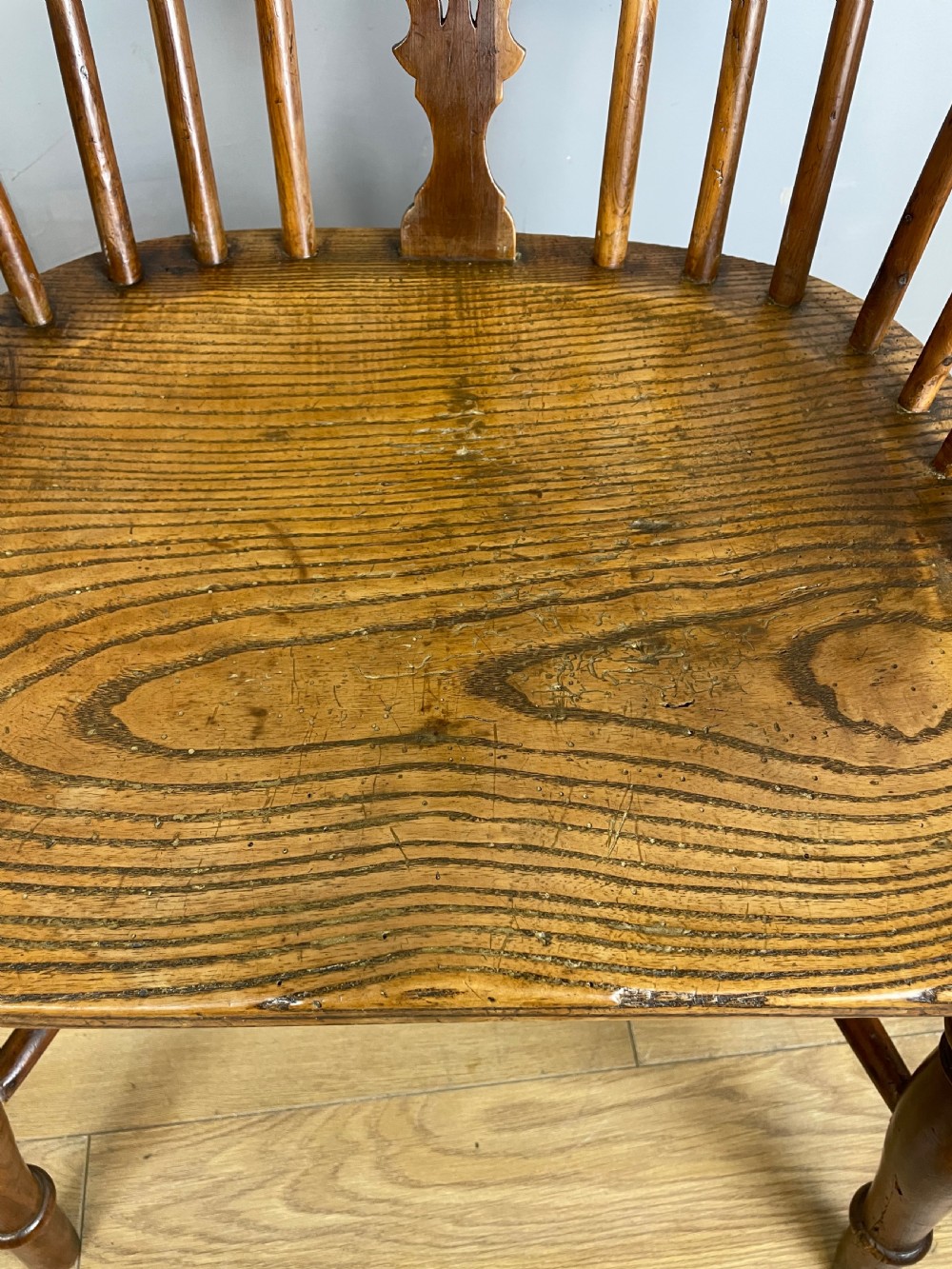 Early nineteenth century yew and elm Windsor chair with crinoline under stretcher  View VII