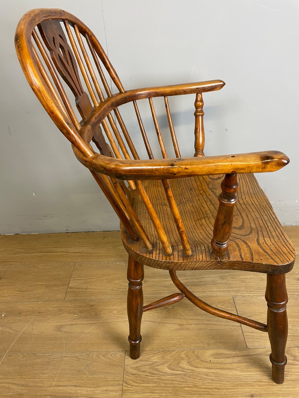 Early nineteenth century yew and elm Windsor chair with crinoline under stretcher  View XI