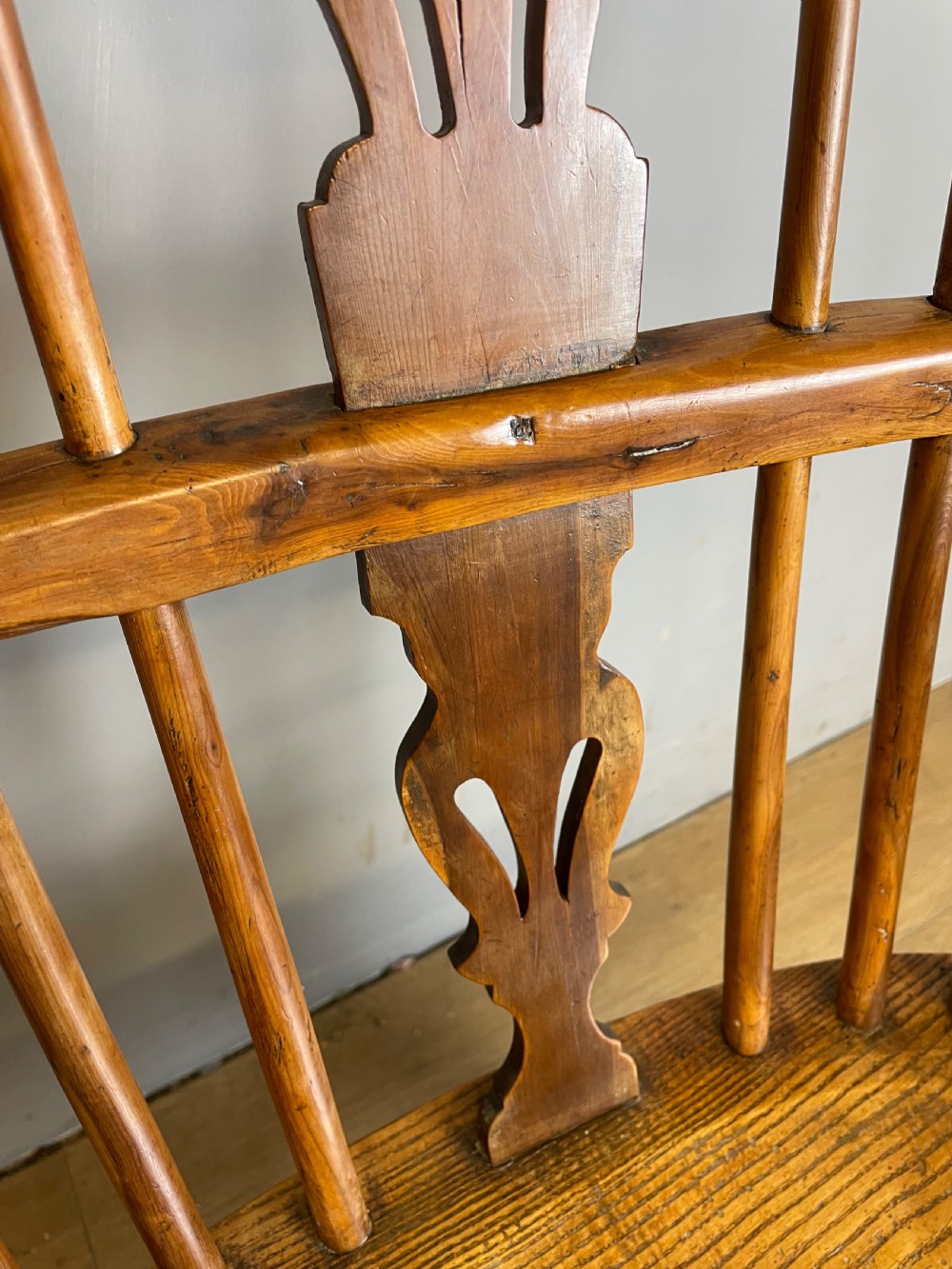 Early nineteenth century yew and elm Windsor chair with crinoline under stretcher  View XII