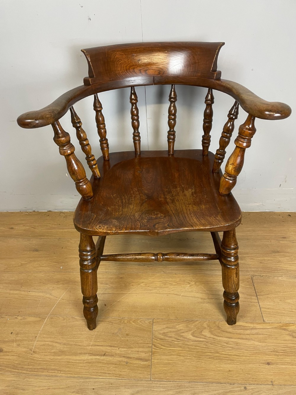 C19TH Ash and elm smokers bow Windsor chair with double h under stretcher  View II