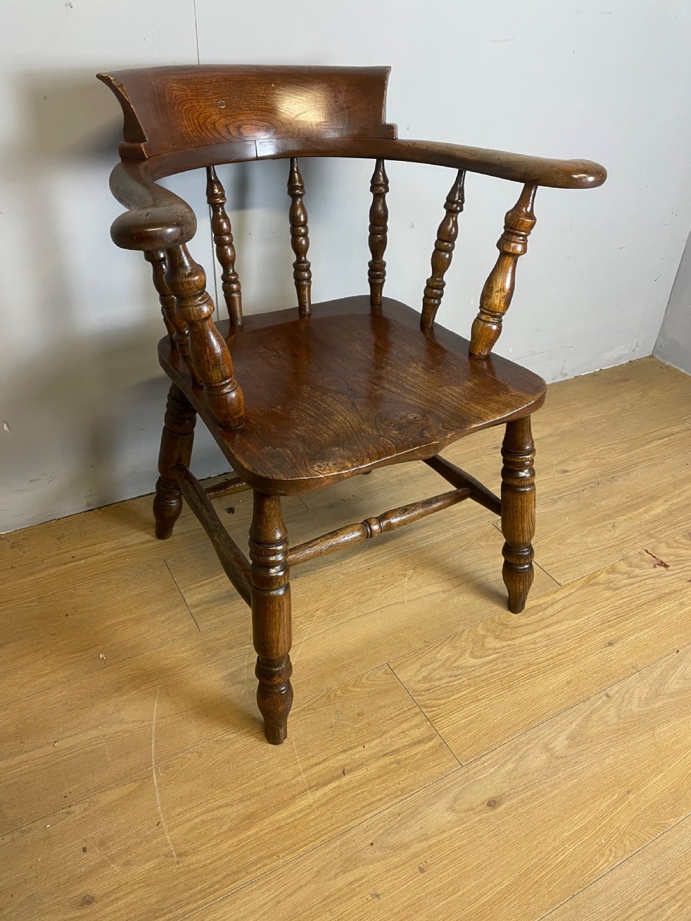 C19TH Ash and elm smokers bow Windsor chair with double h under stretcher  View III