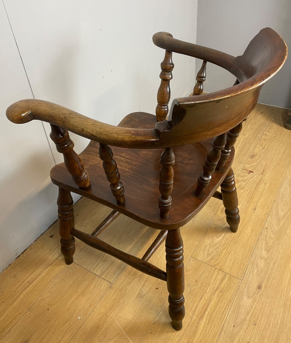 C19TH Ash and elm smokers bow Windsor chair with double h under stretcher  View VIII